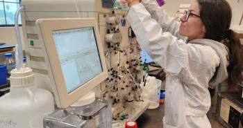 Pierce students operating FPLC machine to purify recombinant protein