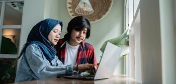 Woman and man at computer