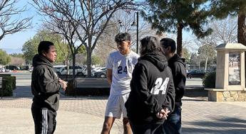 students talking on campus