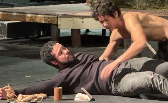 students rehearsing a play