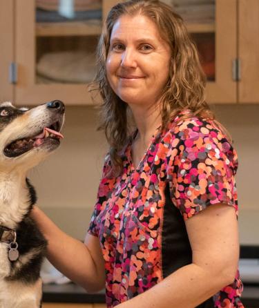 Assistant Vet Tech with her Dog 