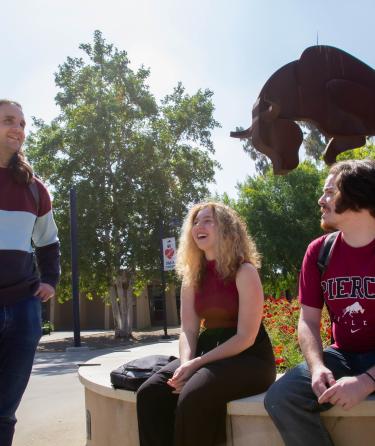 Students Talking on LAPC Statue 