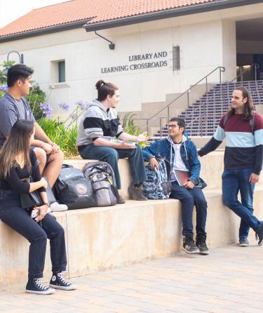 Group of Students Talking on Stairs