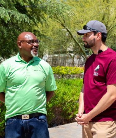 Two Security Staff Talking