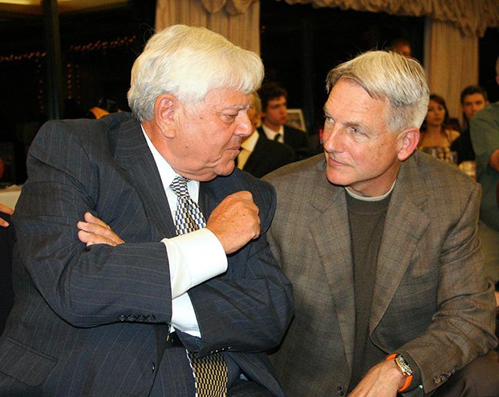 Bob Lyons Chattering with a Man 