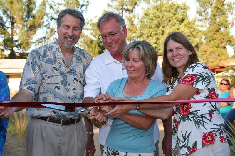 People Cutting Ribbon Innauguration