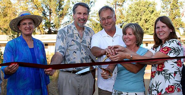 People Cutting the Tie in a Opening