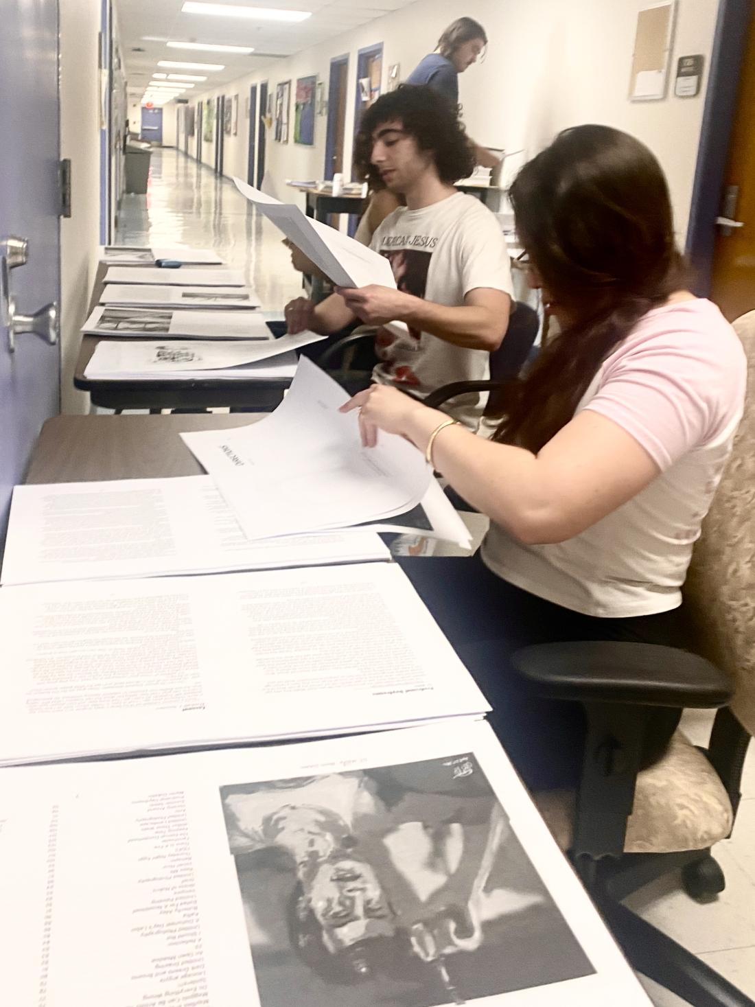 students binding a book
