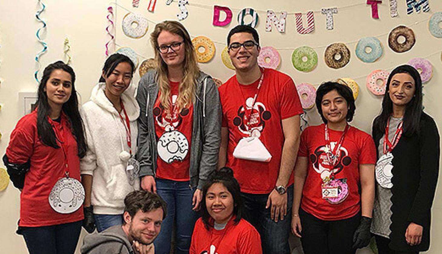 Mentors Celebrating Donut Time