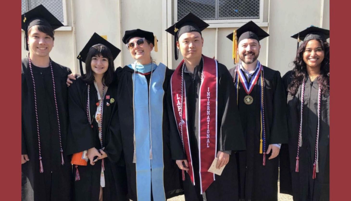 five CAS tutors and director in graduation cap and gown