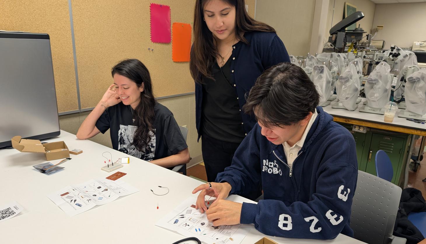 Students building circuits