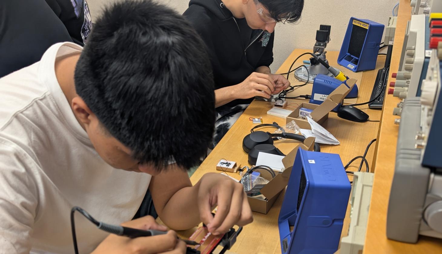 Students soldering